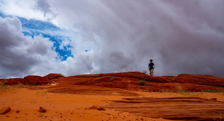 person standing in the desert