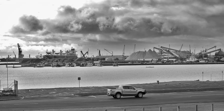 black and white smoggy city with clouds