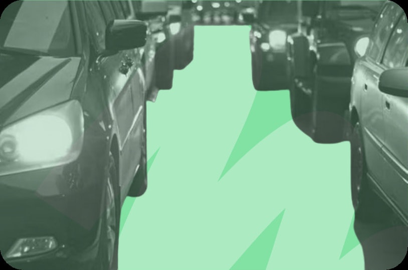 Cars sitting in traffic
