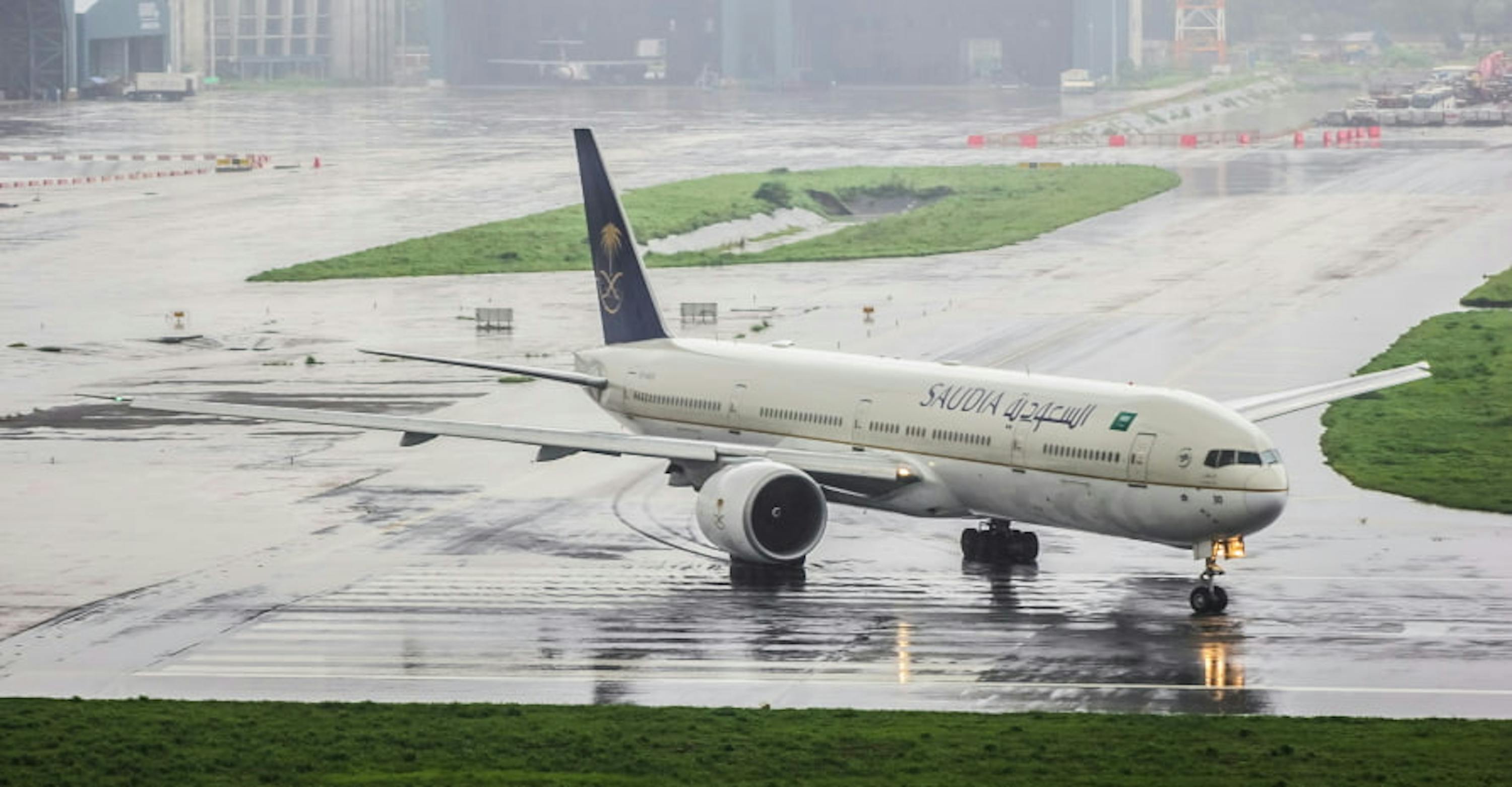 aircraft preparing for takeoff in the rain