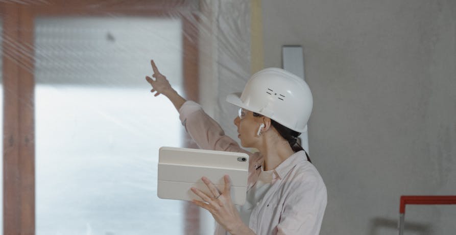 person wearing hard hat at construction site