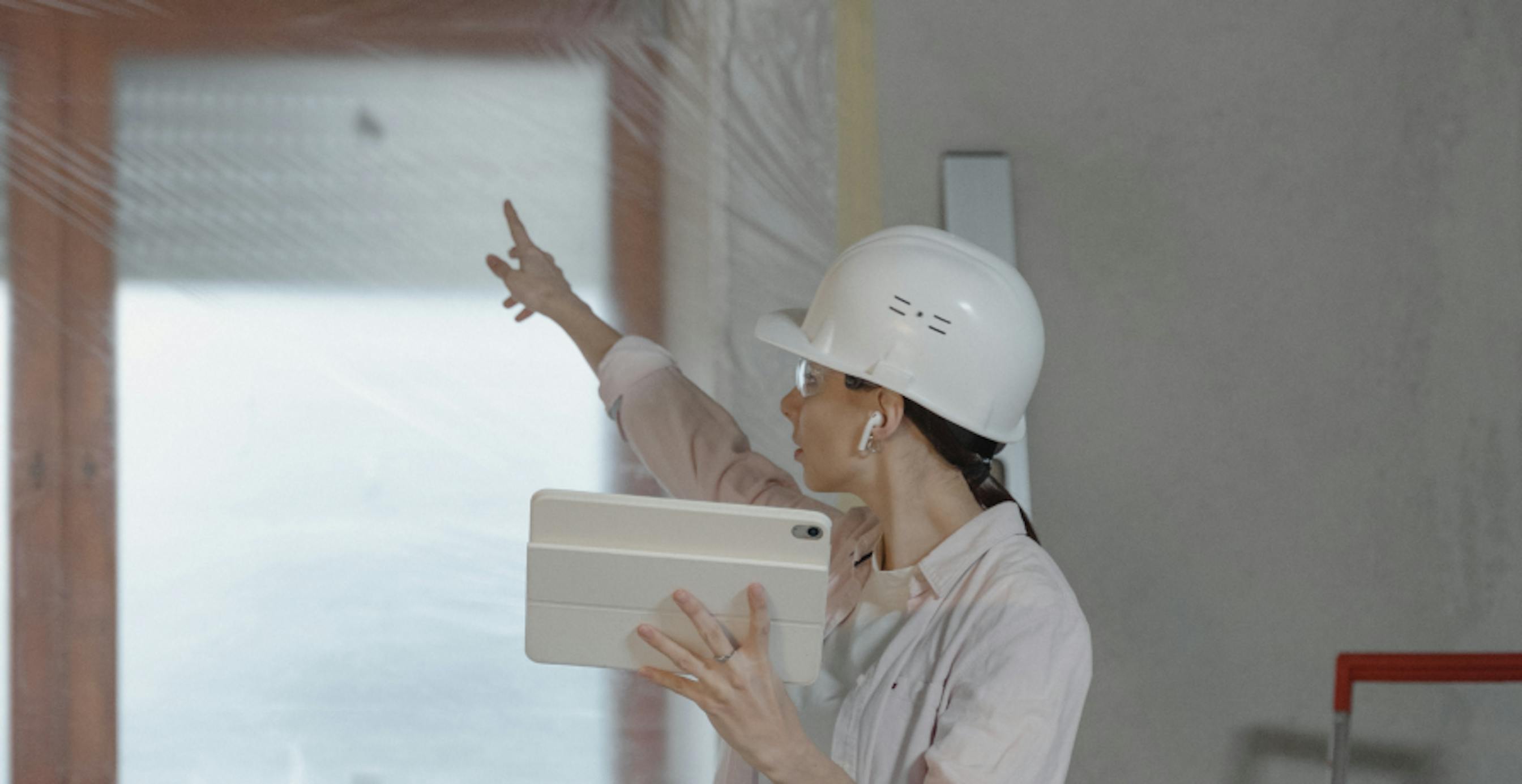 person wearing hard hat at construction site