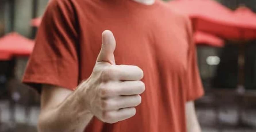 person giving a thumbs up