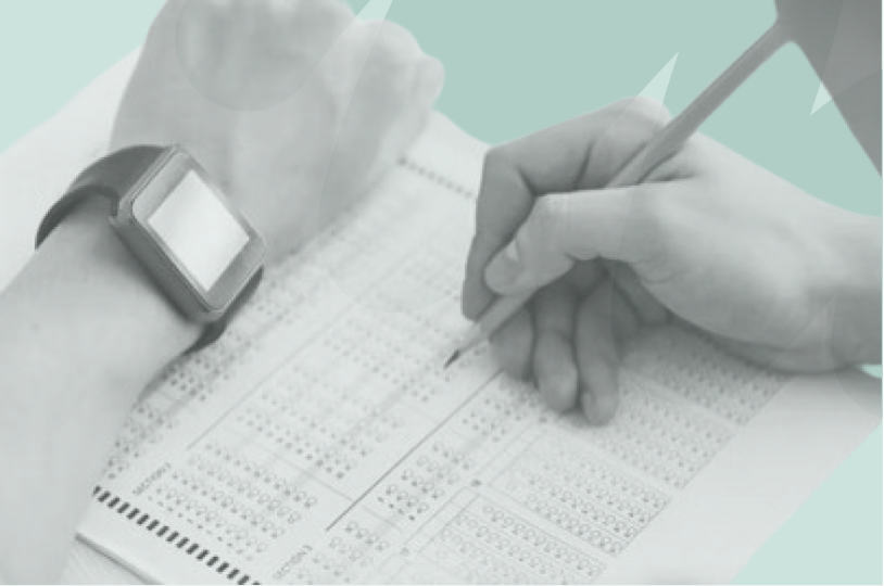 person filling in test scores