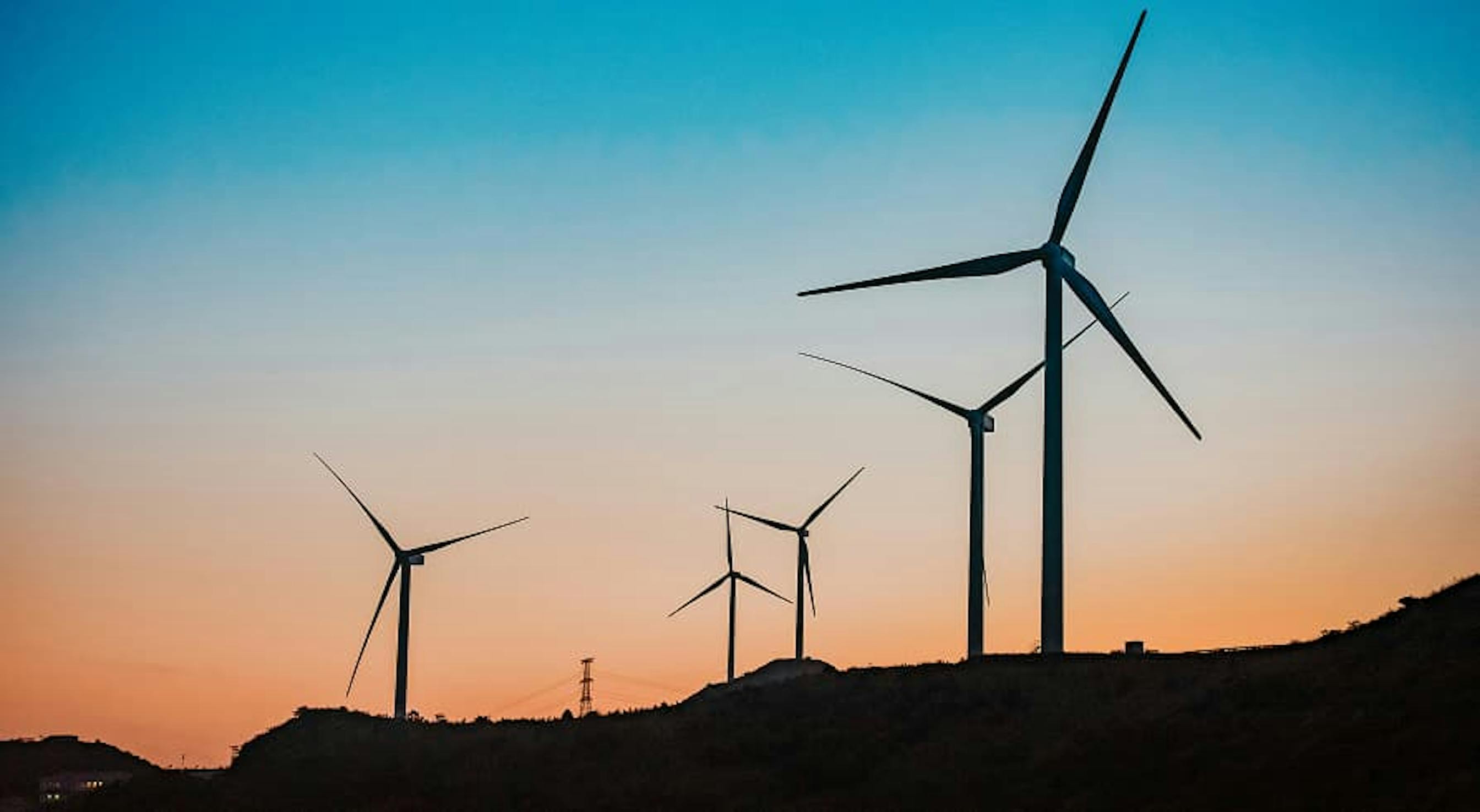 wind turbines in sunset