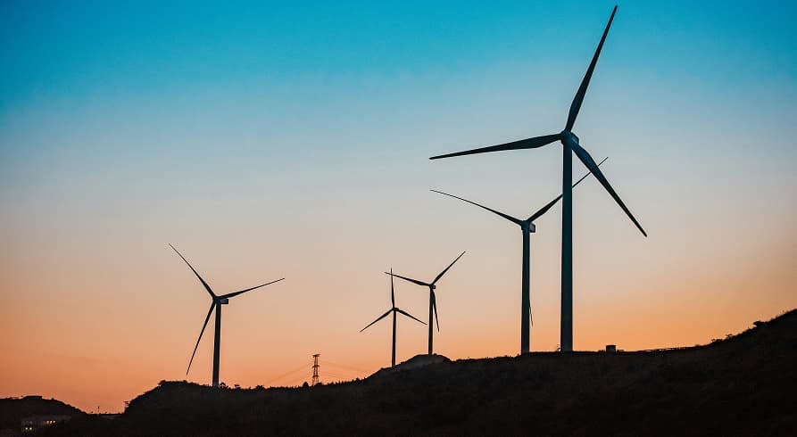 wind turbines in sunset
