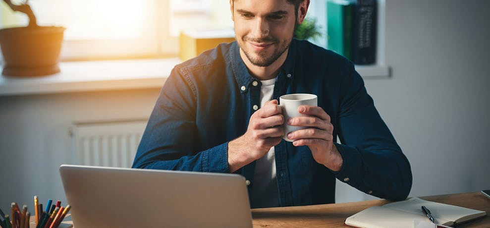 a man with a tea cup