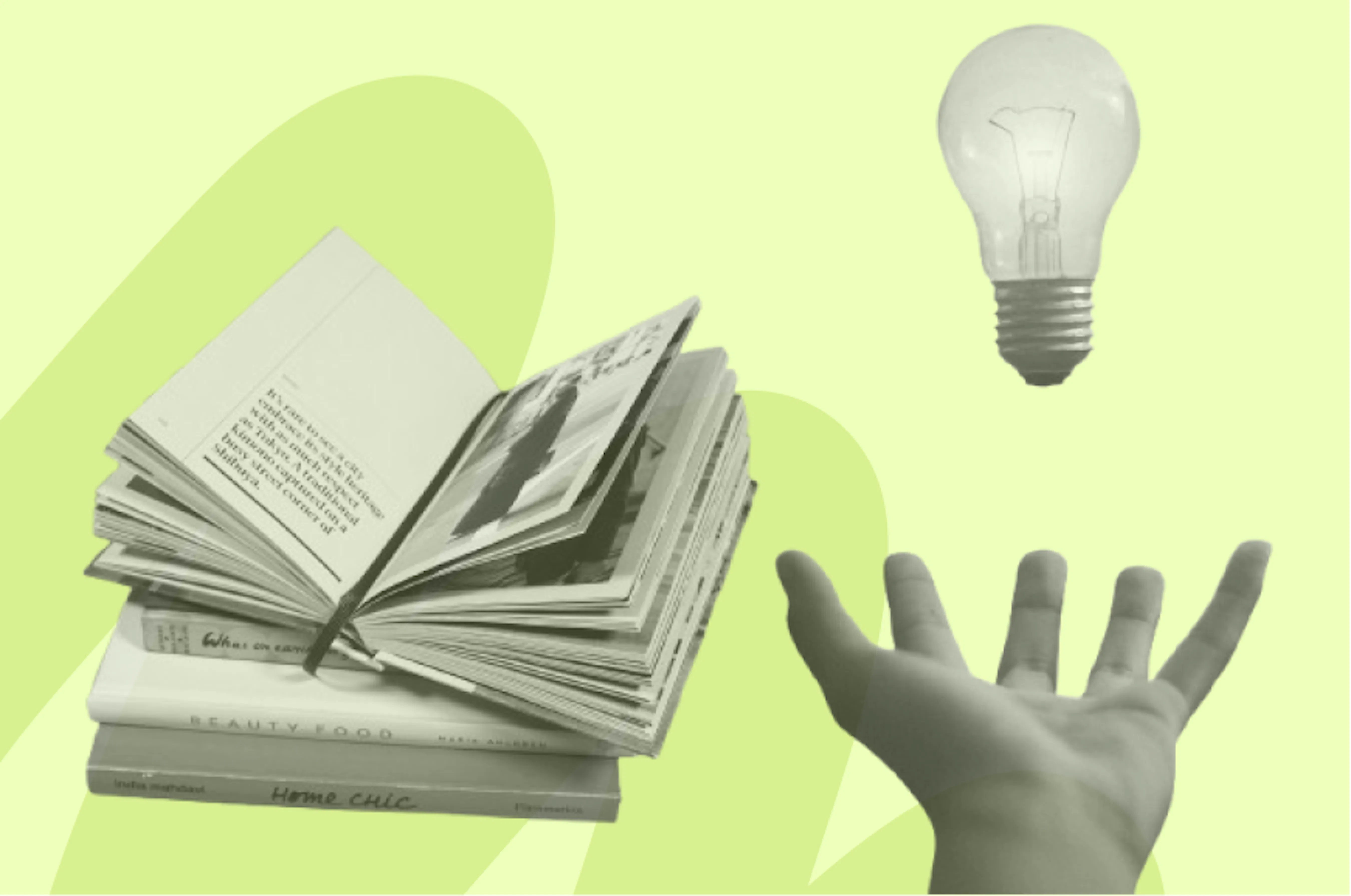 light bulb in hand and book open