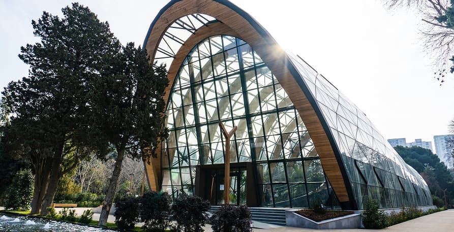 glass buildings outdoor with sun