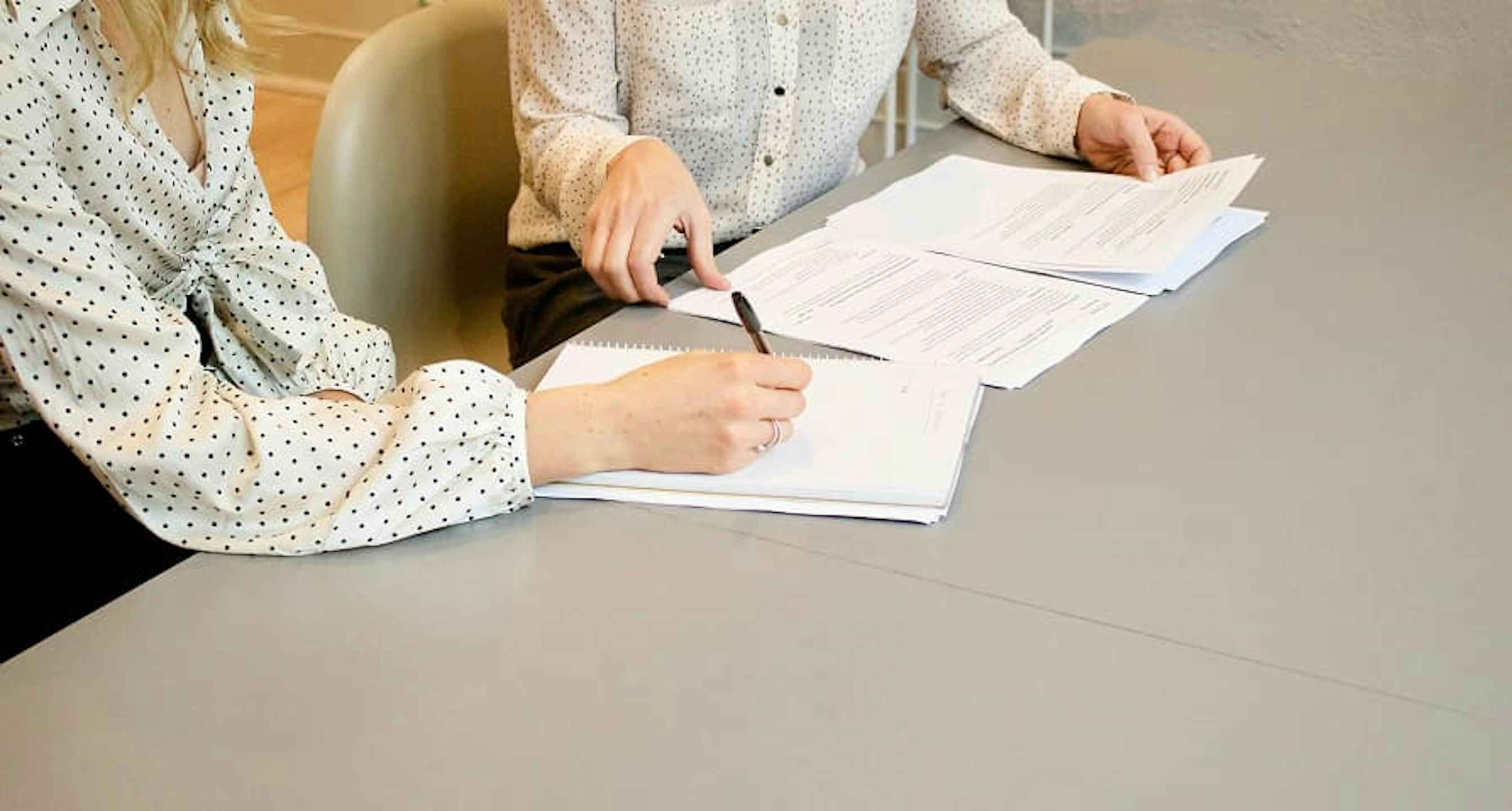 people filling out papers