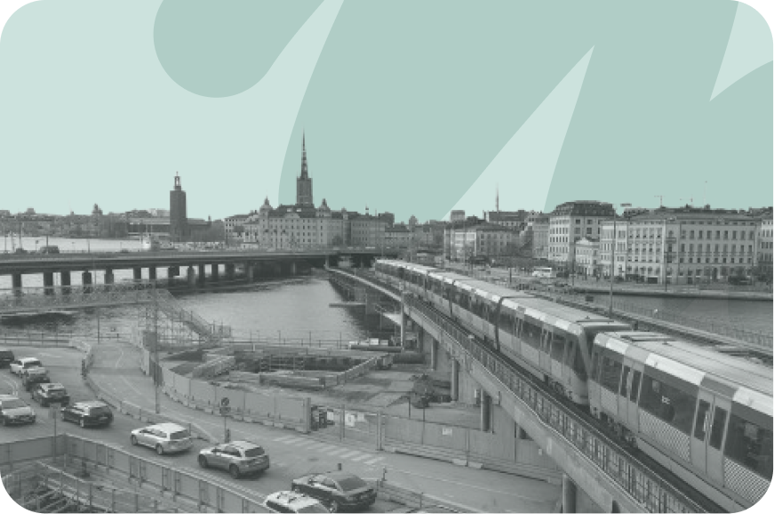 train and cars alongside one another