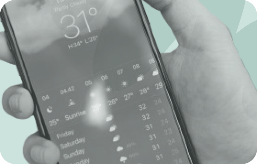 person holding phone with weather app