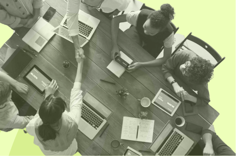 people working at a table bird's eye view