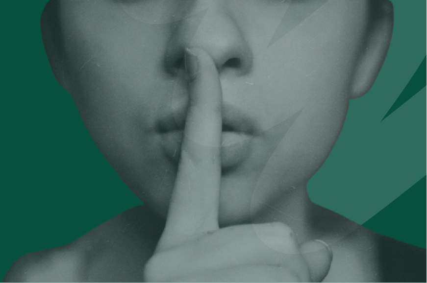 person shhh with index finger over lips