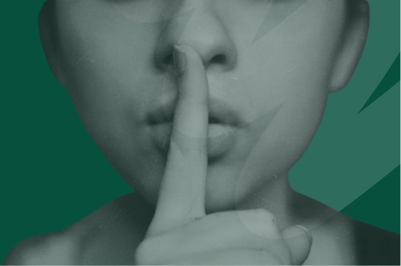 person shhh with index finger over lips