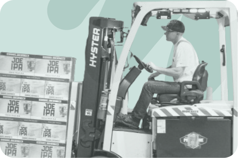 man driving a forklift