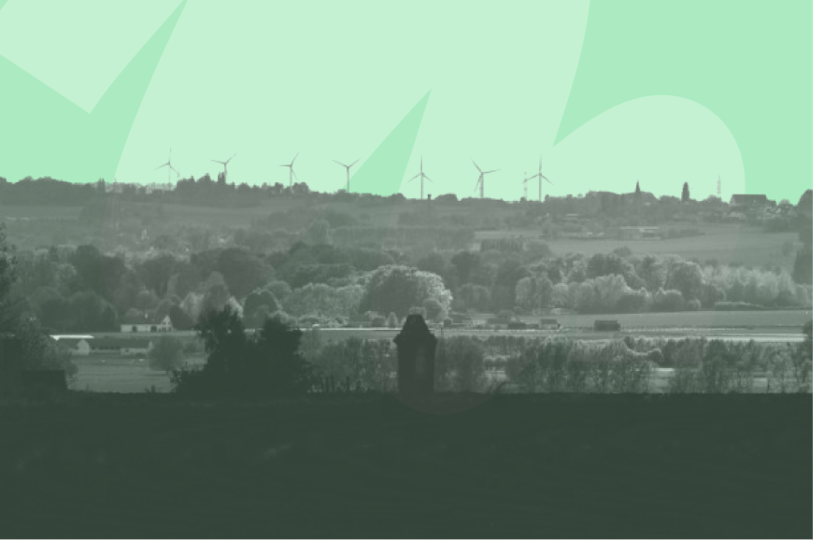 windmills in luscious and open green land