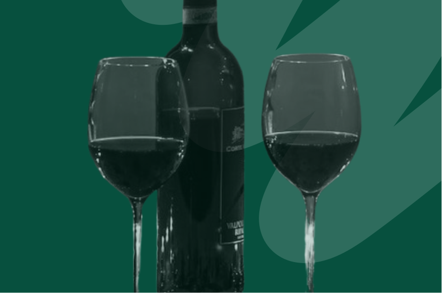 dark wine bottle with two glasses