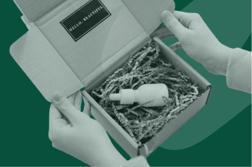 someone opening a box with product inside