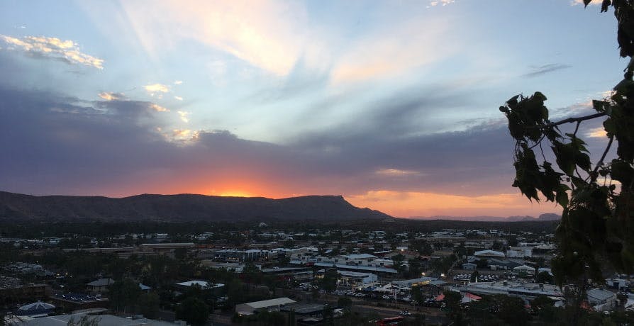 sunset setting over mountain in alice springs