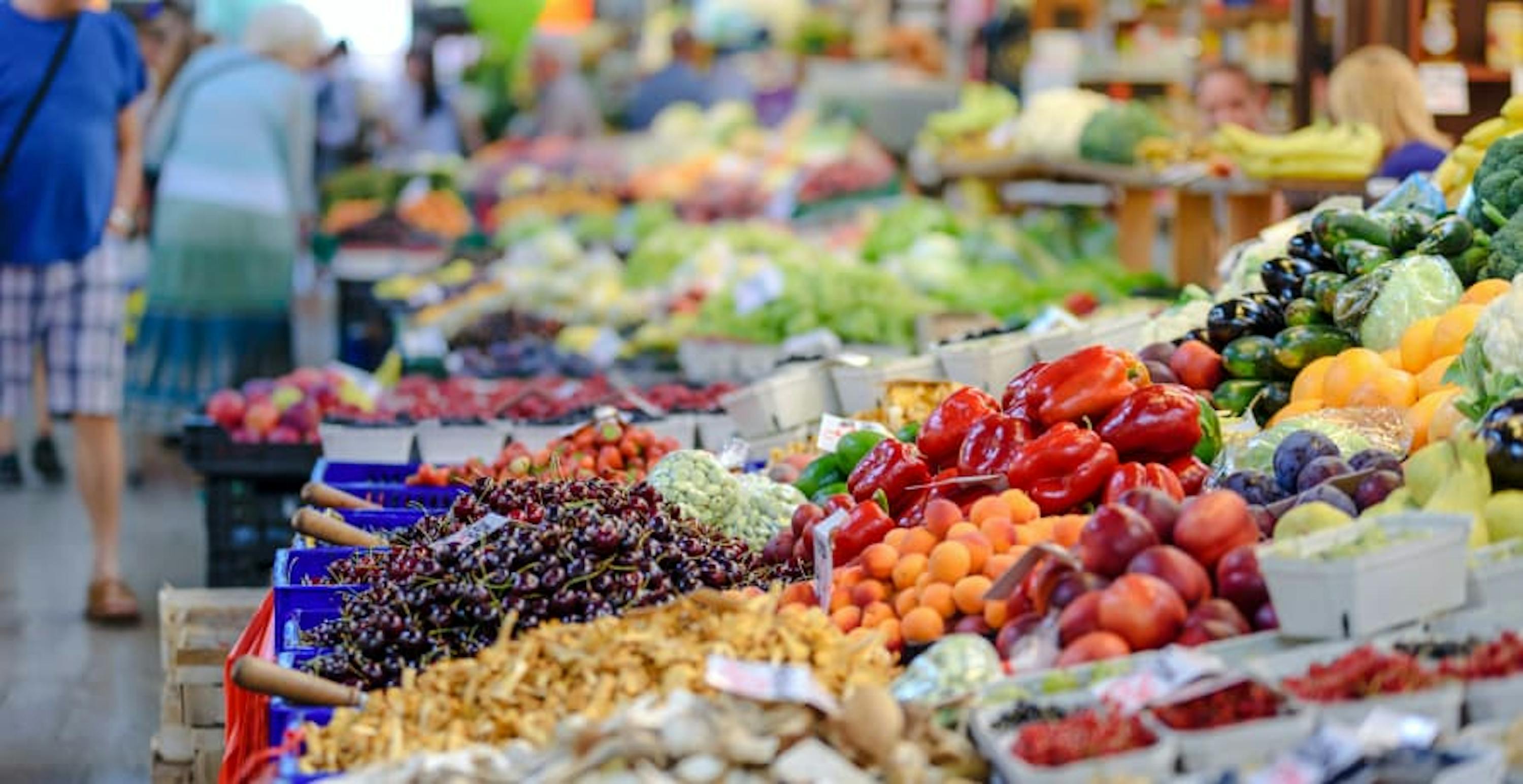 supermarket filled with fresh vegetables and fruit