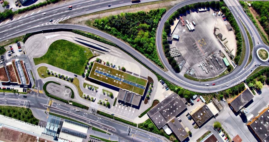 bird's eye view of traffic and green roofs