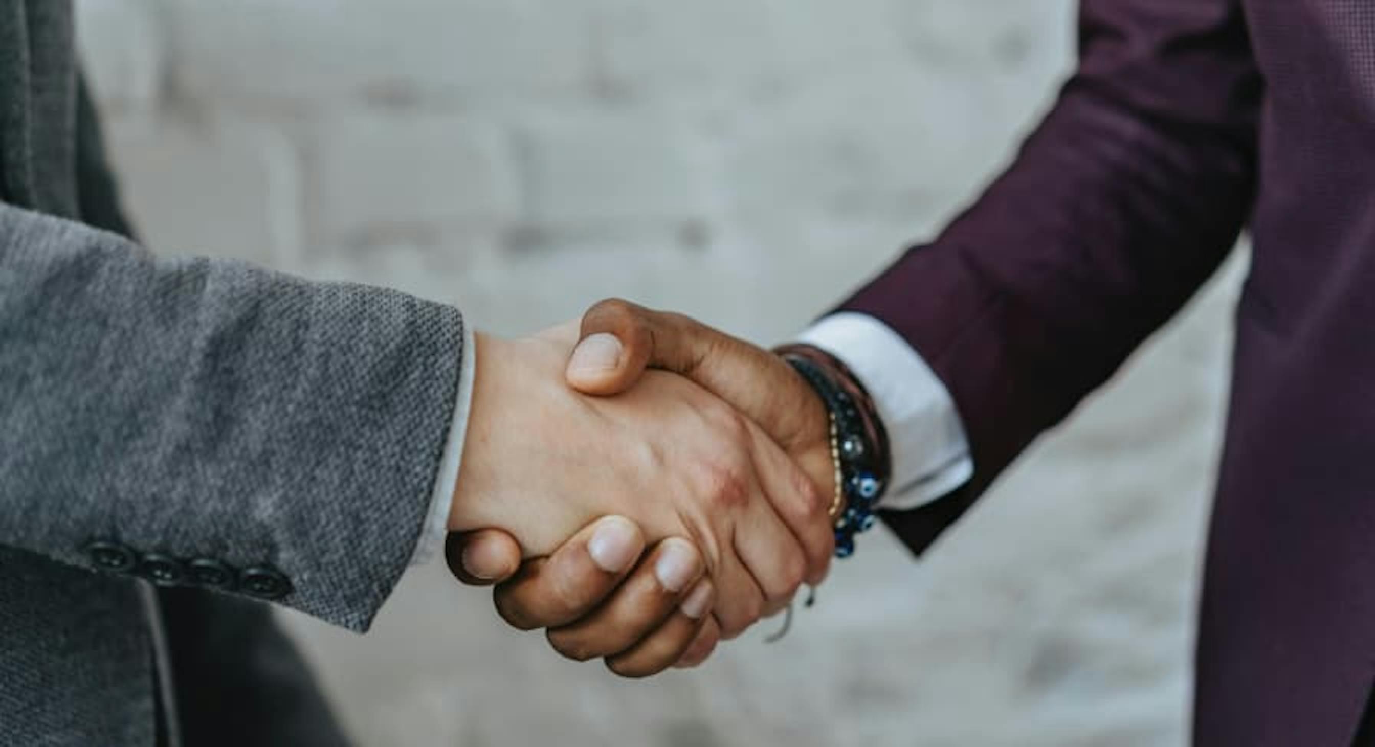 people handshaking