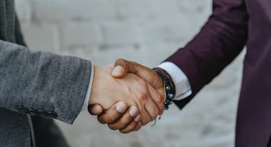 workers shaking hands