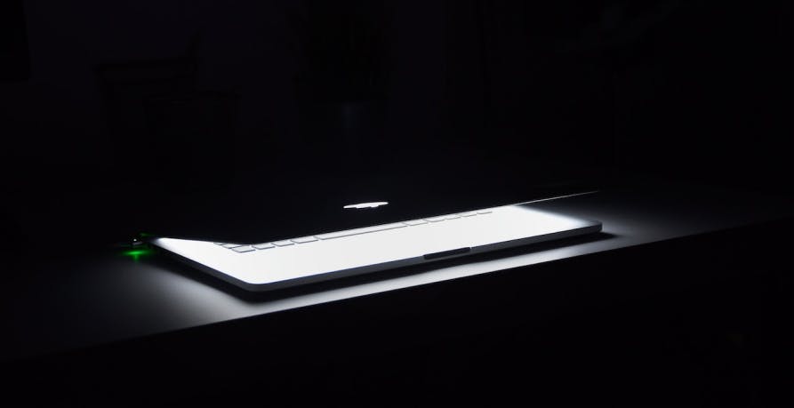 a laptop in the dark
