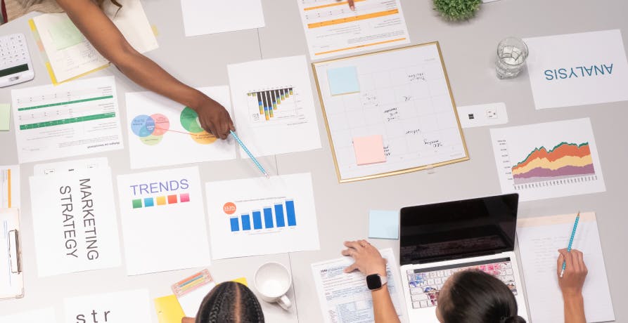 people planning from data on paper