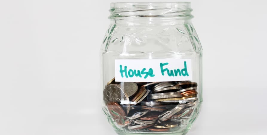 house fund coins in jar