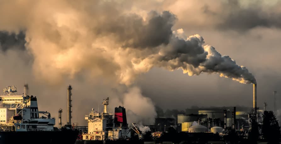 large factories releasing pollution into the air