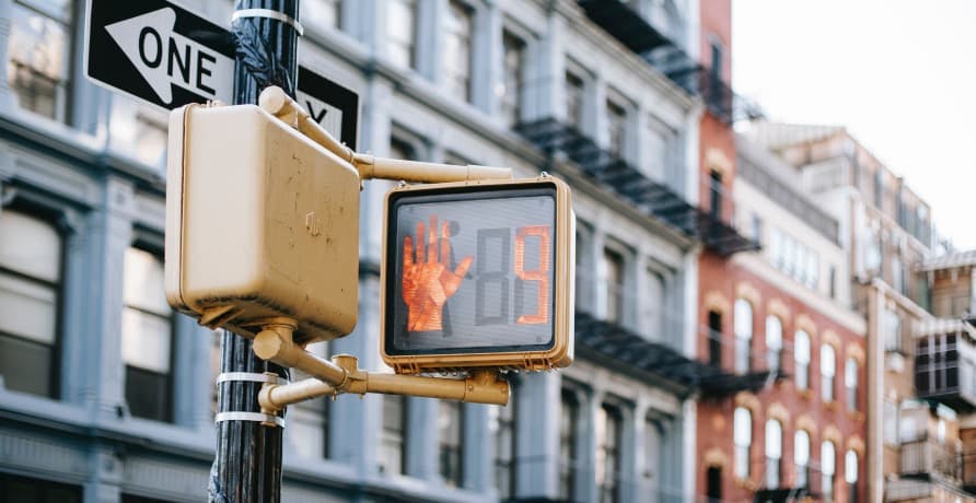 stop sign on a cross walk in lower manhttan