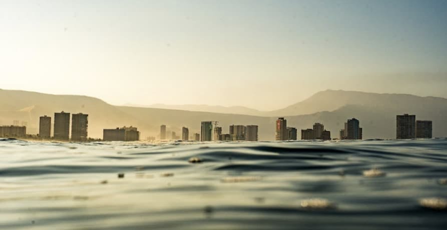 buildings in the distance from out at sea