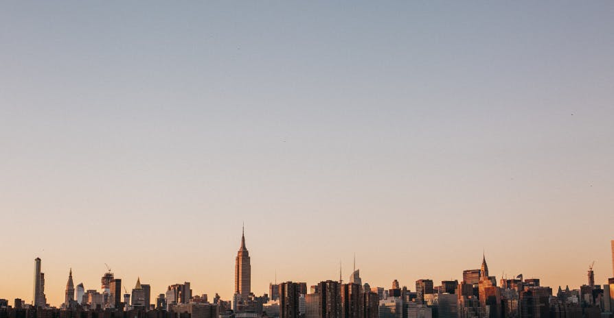 view of NYC skyline at dusk