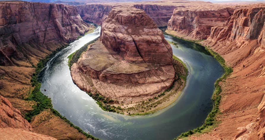 360 water surrounding red rock