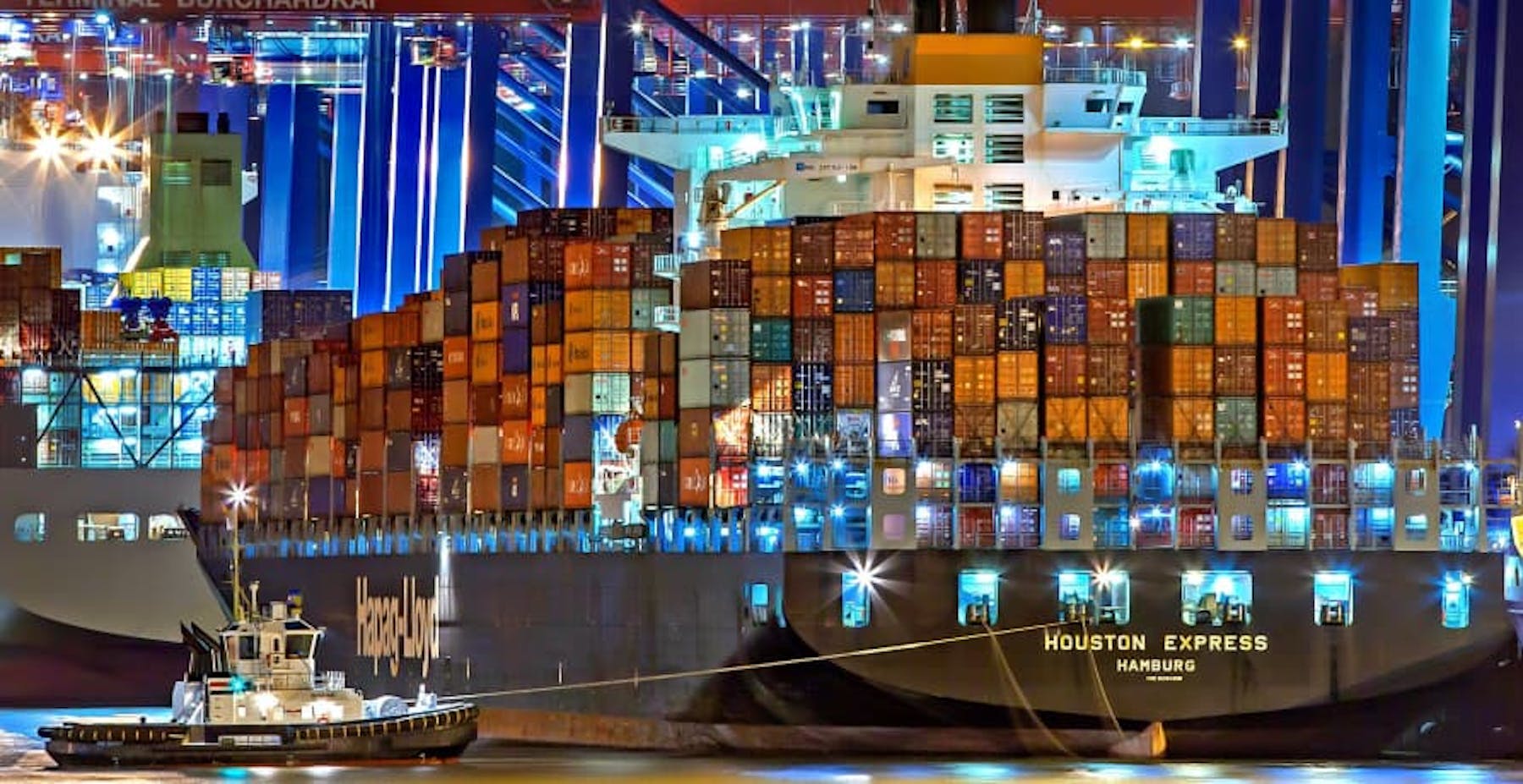 large ship with lots of shipping containers