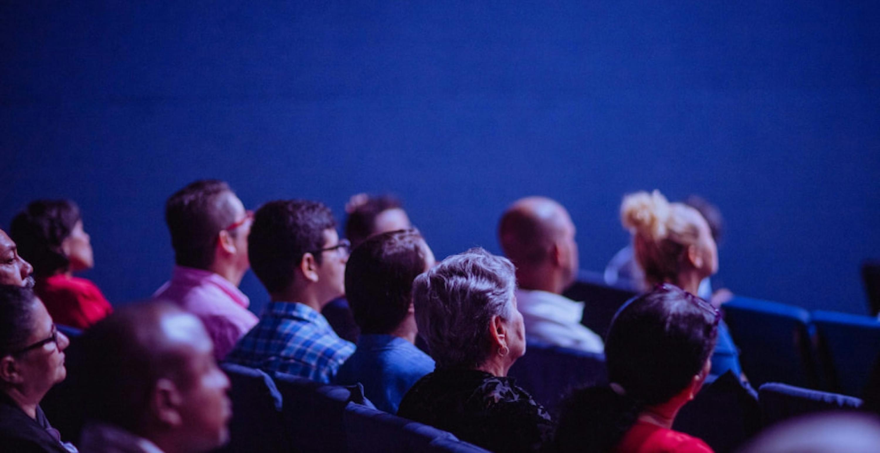 people attending a conference