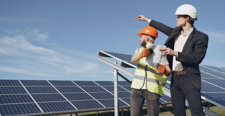 constructors building solar panels