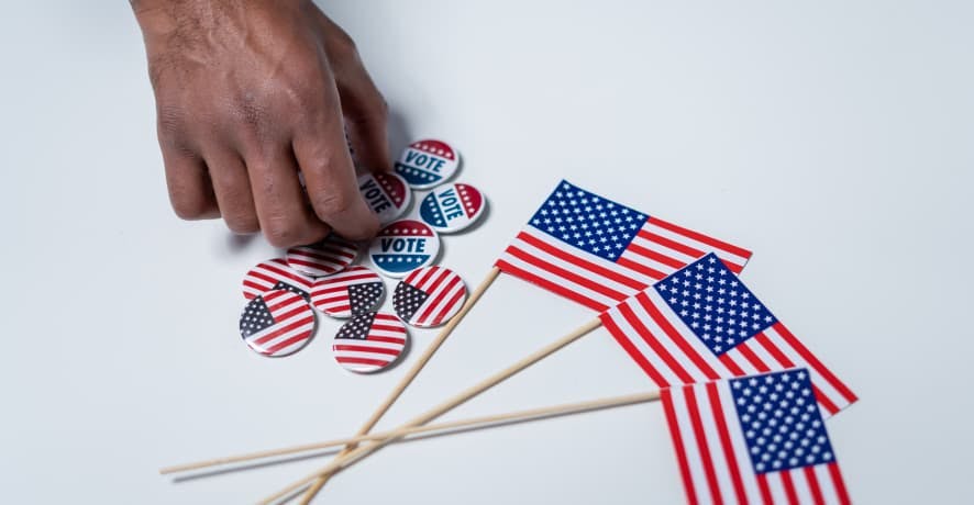 us flags and I voted pins