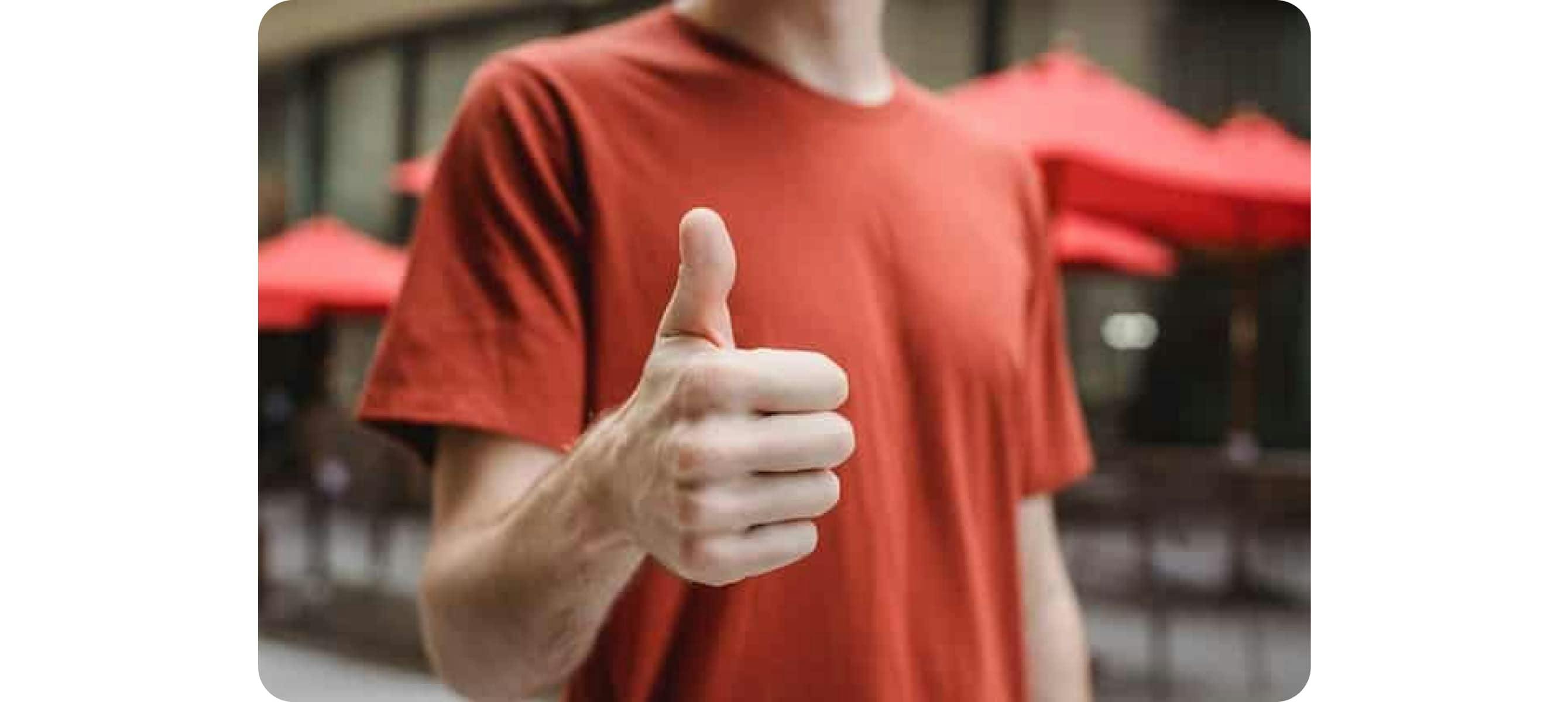 person giving a thumbs up