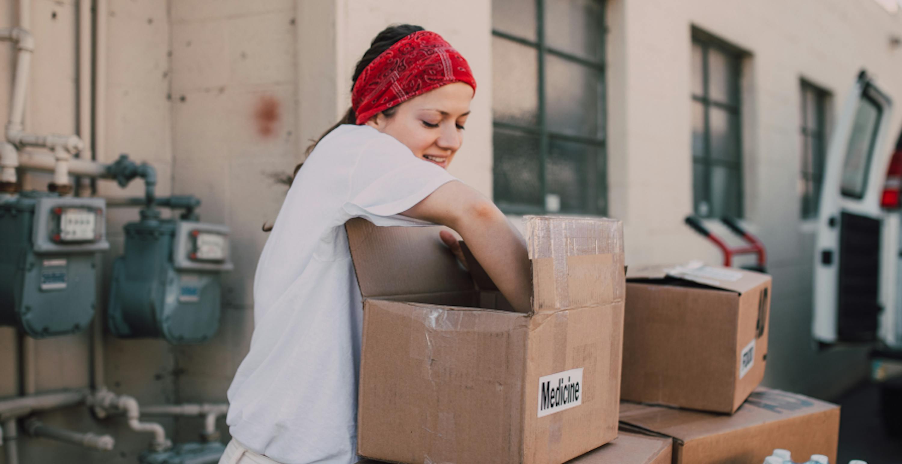 girl packing boxes