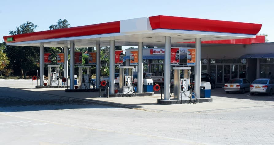 red and white gas station outside