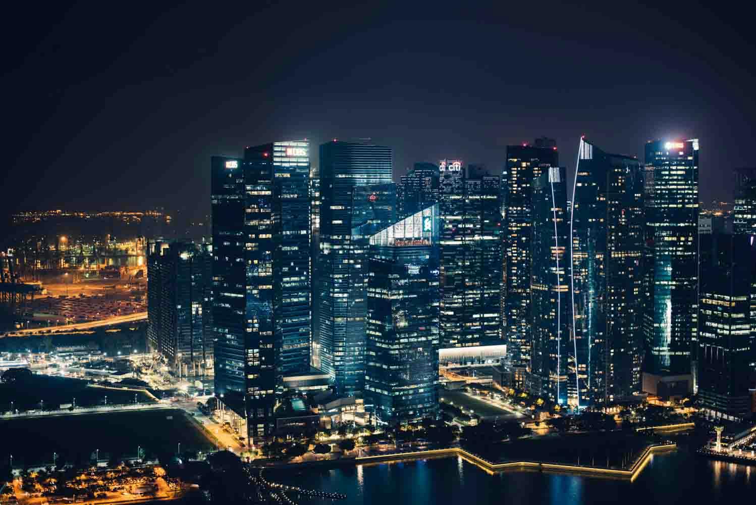 View of a luminous city with skyscraper at night