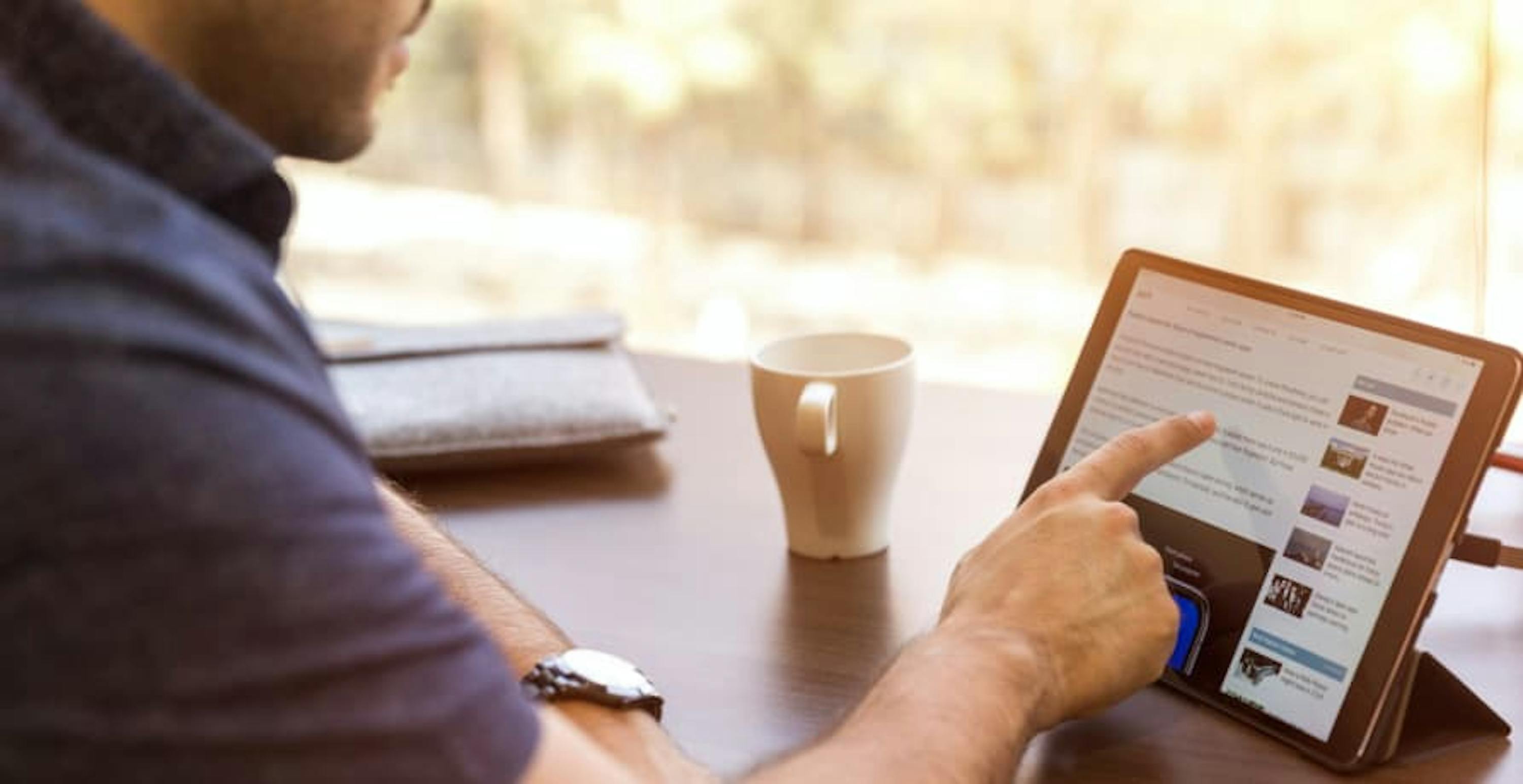 man using a tablet