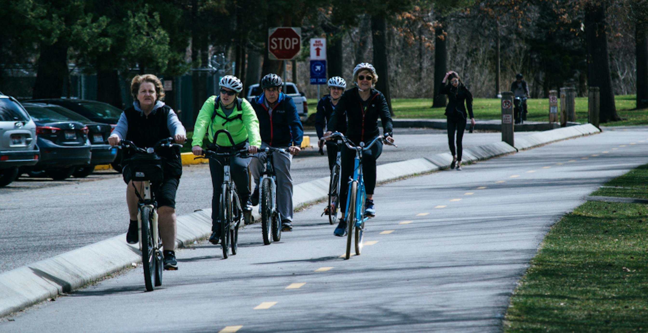 people cycling in a city