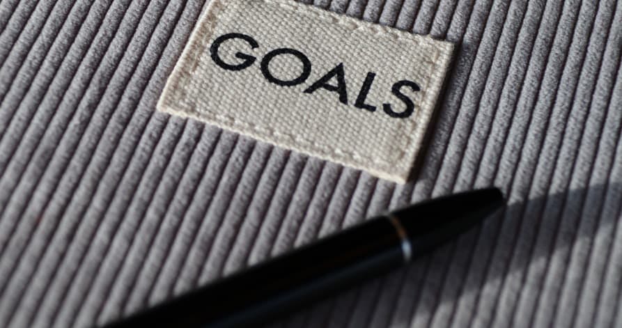 goals embroidered and pen