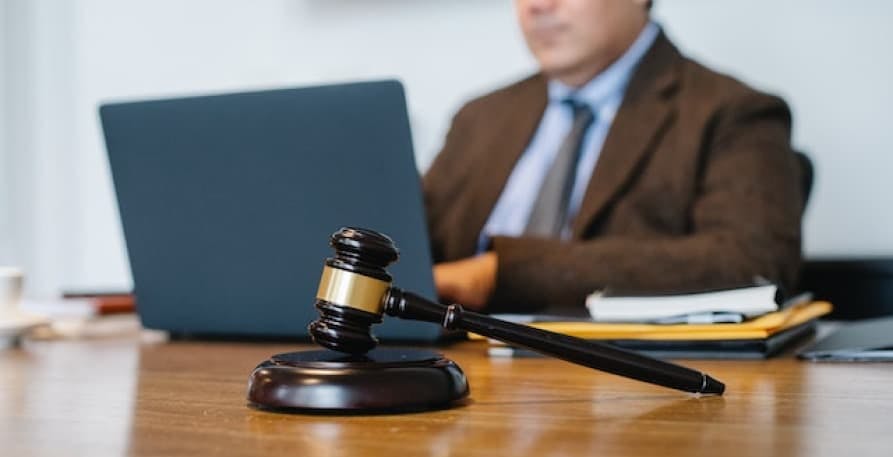 lawyer looking over computer