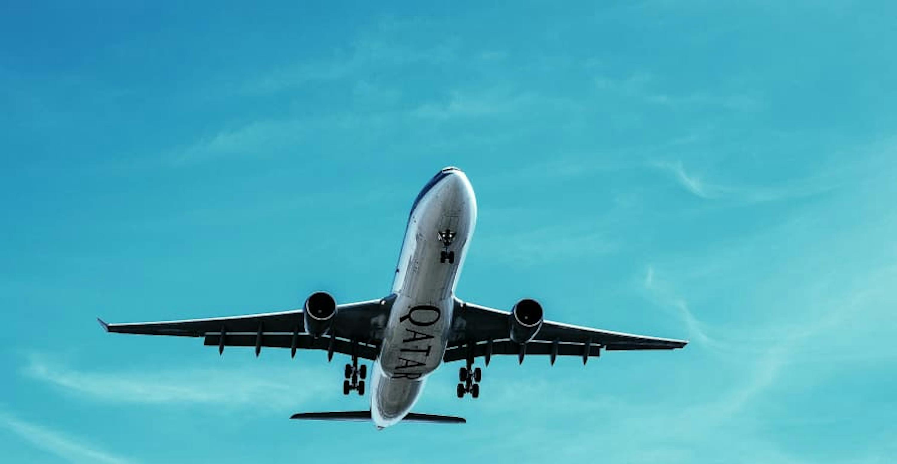 airplane flying in clear skies