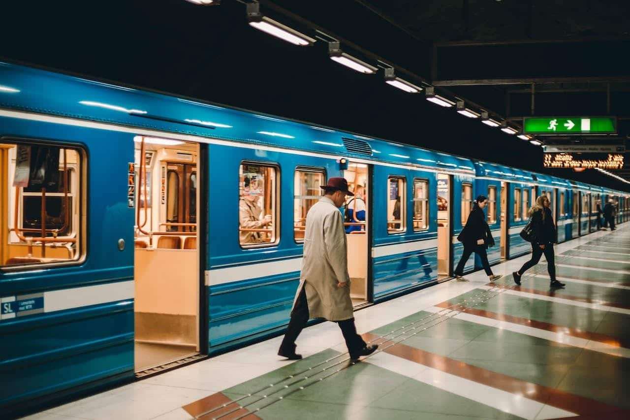 Metro station with passengers on platform